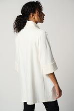 Load image into Gallery viewer, Step out with sophistication and grace in this timeless cocoon coat. Raglan sleeves, side pockets, and a single-button closure combine fashion with function for an effortlessly chic look. Crafted from quality heavy knit, its unlined design allows for effortless comfort without compromising elegance.