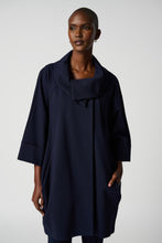 Load image into Gallery viewer, Step out with sophistication and grace in this timeless cocoon coat. Raglan sleeves, side pockets, and a single-button closure combine fashion with function for an effortlessly chic look. Crafted from quality heavy knit, its unlined design allows for effortless comfort without compromising elegance.