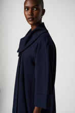 Load image into Gallery viewer, Step out with sophistication and grace in this timeless cocoon coat. Raglan sleeves, side pockets, and a single-button closure combine fashion with function for an effortlessly chic look. Crafted from quality heavy knit, its unlined design allows for effortless comfort without compromising elegance.