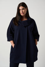 Load image into Gallery viewer, Step out with sophistication and grace in this timeless cocoon coat. Raglan sleeves, side pockets, and a single-button closure combine fashion with function for an effortlessly chic look. Crafted from quality heavy knit, its unlined design allows for effortless comfort without compromising elegance.