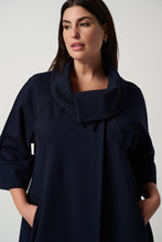Load image into Gallery viewer, Step out with sophistication and grace in this timeless cocoon coat. Raglan sleeves, side pockets, and a single-button closure combine fashion with function for an effortlessly chic look. Crafted from quality heavy knit, its unlined design allows for effortless comfort without compromising elegance.