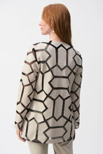 Load image into Gallery viewer, Indulge in the irresistible charm of this laser-cut mesh jacket. It is a modern work of art made from premium leatherette that blends futuristic style with refined sophistication. The jacket flaunts a hook-and-eye front closure, emphasizing its contemporary aesthetic.
