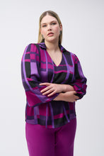 Load image into Gallery viewer, The essence of contemporary style, this satin top carries undeniable charm. The design features an alluring abstract plaid print that highlights your flair for great fashion. The long, puffed sleeves with elastic cuffs add a dramatic touch while the boxy silhouette offers both a comfortable, yet chic feel. The V-shaped neckline boasts a sleek shirt collar accentuating the garment’s poised look.