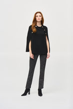 Load image into Gallery viewer, Bring an air of casual elegance to your wardrobe with this chic cover-up. Tailored in a jacquard sweater knit fabric, the garment features a sleek crew neck with a military shank button detail, giving the piece an irresistible appeal. The poncho silhouette’s versatile style is the perfect canvas to create a look to suit any occasion.