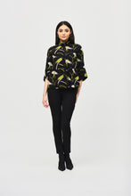 Load image into Gallery viewer, Unveil your bold flair for style with this sweater knit jacket. The trapeze silhouette sways beautifully while its chic abstract print and three-quarter sleeves with tulip cuffs exude an air of unique sophistication. The stand collar elevates the garment’s refined look as the statement front button closure and back yoke with panels add the perfect finishing touch to this stunning modern design.