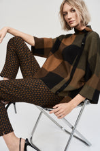 Load image into Gallery viewer, We all need a little plaid in our wardrobe. This cozy jacquard sweater knit top features a striking three-tone plaid pattern that's just as extraordinary as its design. A loose-fitting funnel neck adorned with decorative buttons on the side, along with three-quarter bell sleeves and a roomy fit give this piece an endlessly attractive appeal.