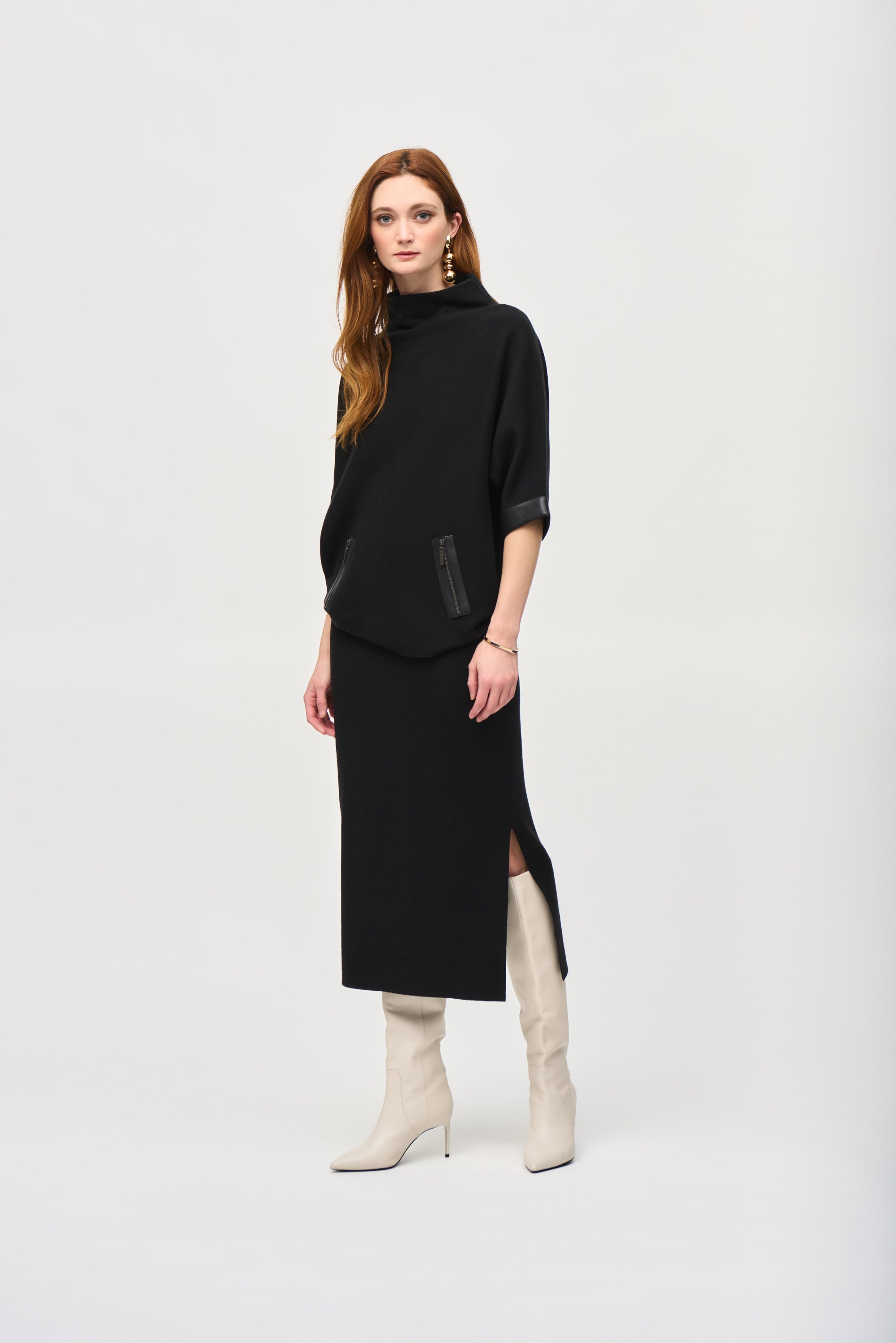 Spice up your sweater collection with this stylish funnel neck top. Crafted from a luxurious brushed knit and detailed with leatherette trim at the cuffs and faux zipped side pockets, you'll love the uniqueness and variety this piece offers.