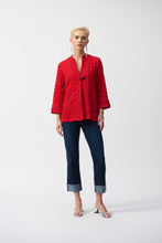 Load image into Gallery viewer, Showcase your love for bold designs with this Joseph Ribkoff bubble jacquard jacket. The three-quarter cuffed sleeves work beautifully with the garment’s chic trapeze silhouette. The crew neck and front toggle closure add a hint of flair to this unique modern design.