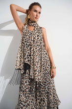 Load image into Gallery viewer, This chiffon tunic boasts a captivating animal print that exudes undeniable glamour. The piece features a sleeveless A-line silhouette and a chic scoop neckline, lending a sophisticated feel with timeless appeal. The garment’s reversible design and detachable scarf with fringe at the hem allow you to transform your look to suit any occasion.