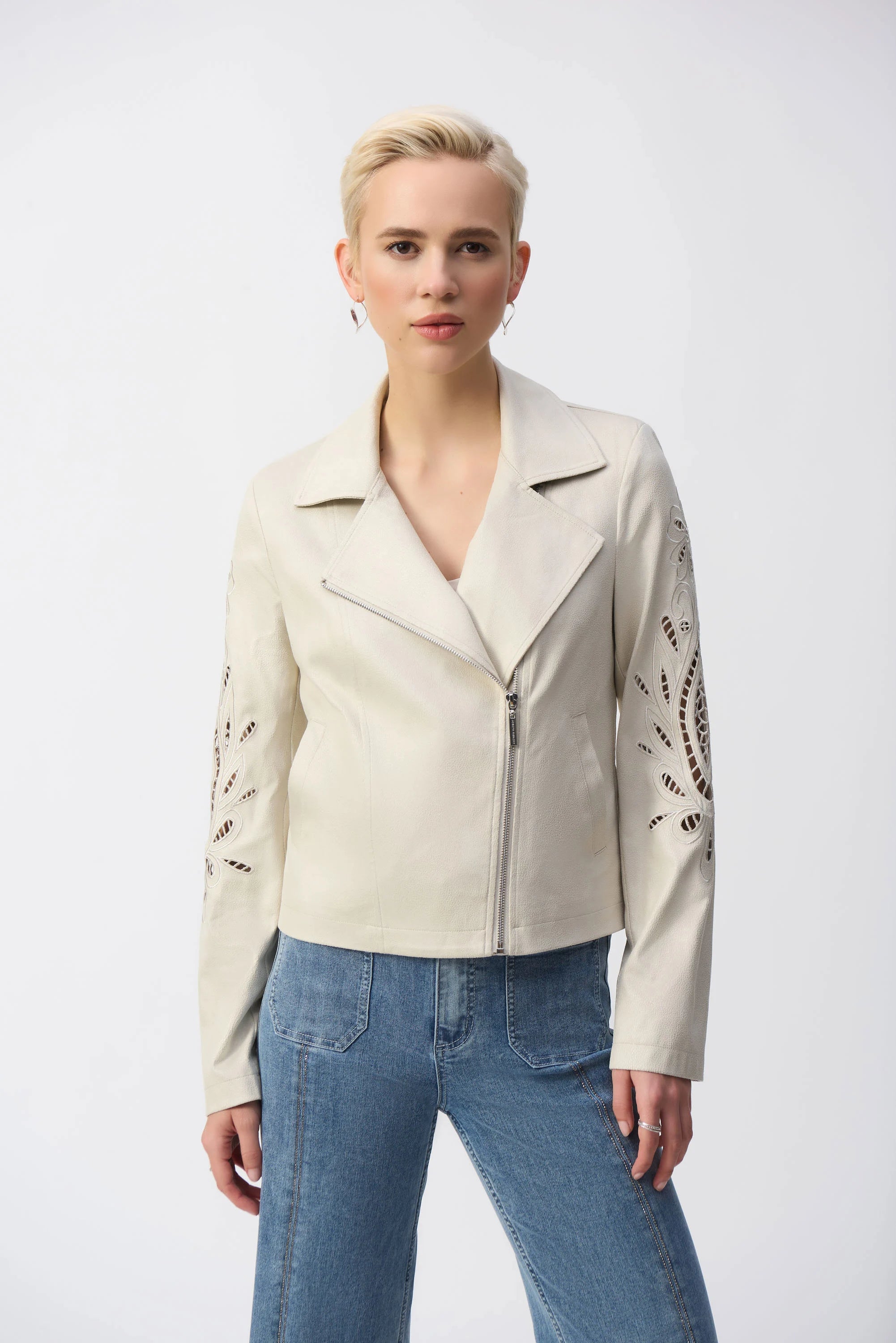 Let your inner rockstar shine in this Joseph Ribkoff faux-suede moto jacket. A notched collar and fitted silhouette give this piece that classic biker appeal, while foiling and embroidery softens and refines the look.
