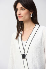 Load image into Gallery viewer, This Joseph Ribkoff jacket highlights flawless style and undeniable poise. Crafted in a jacquard fabric, the garment presents a chic swing silhouette with a charming front button closure creating a beautiful V-shaped neckline when secured. The three-quarter cuffed sleeves lend a bold look to this remarkable contemporary piece.