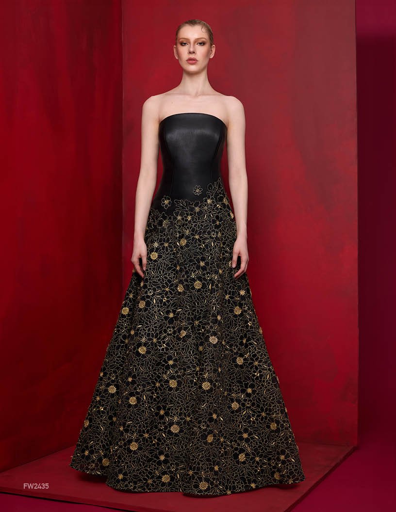 Exquisite Lucian Matis long, strapless gown with pleather top and adorned with flower pattern.