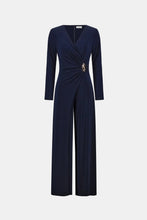 Load image into Gallery viewer, Silky Knit Wide Leg Wrap Jumpsuit
This wide-leg jumpsuit in silky knit features a wrap-style neckline and long straight sleeves for a refined silhouette. An overlapped leg on one side is accente…