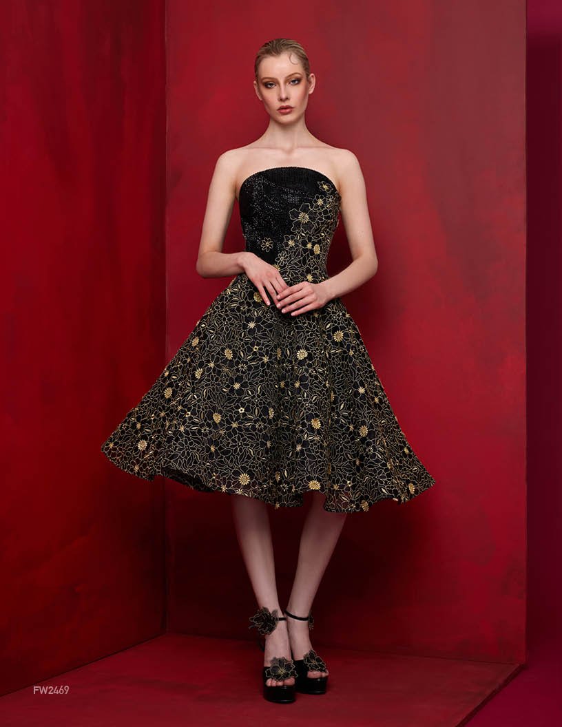 Exquisite Lucian Matis cocktail dress with divine crystal details, fitted with a fun flair.
