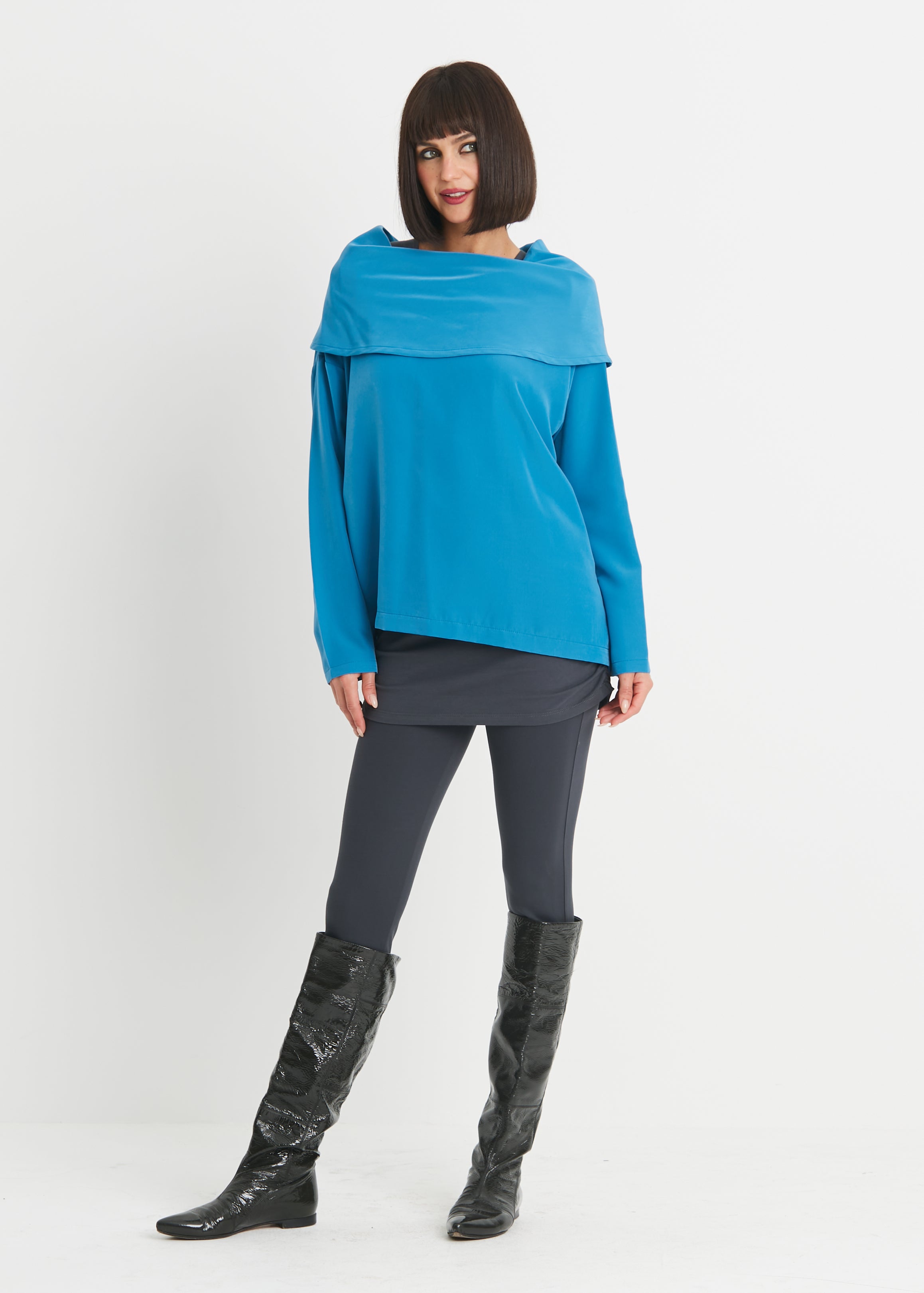 Stylish cowl neck blouse available in black or lake colors.Women's clothing Long Island, Woodbury, Greenvale, New York. High-end women's fashion Long Island Designer clothing Woodbury NY Luxury women's clothing Greenvale Fashion boutiques on Long Island Women's designer fashion stores Woodbury NY fashion boutiques