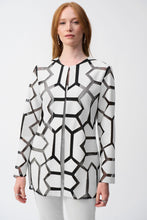 Load image into Gallery viewer, Indulge in the irresistible charm of this laser-cut mesh jacket. It is a modern work of art made from premium leatherette that blends futuristic style with refined sophistication. The jacket flaunts a hook-and-eye front closure, emphasizing its contemporary aesthetic.
