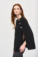 Load image into Gallery viewer, ​​Bring an air of casual elegance to your wardrobe with this chic cover-up. Tailored in a jacquard sweater knit fabric, the garment features a sleek crew neck with a military shank button detail, giving the piece an irresistible appeal. The poncho silhouette’s versatile style is the perfect canvas to create a look to suit any occasion.
