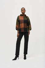 Load image into Gallery viewer, We all need a little plaid in our wardrobe. This cozy jacquard sweater knit top features a striking three-tone plaid pattern that&#39;s just as extraordinary as its design. A loose-fitting funnel neck adorned with decorative buttons on the side, along with three-quarter bell sleeves and a roomy fit give this piece an endlessly attractive appeal.
