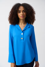 Load image into Gallery viewer, Indulge in the casual elegance of this lovely gauze top. The piece is tailored in a polished straight silhouette with a sleek shirt collar and front buttons, a classic, yet versatile look that can effortlessly transition from morning meetings to evening cocktails. The three-quarter sleeves with folded cuffs add character to this modern-style staple.
