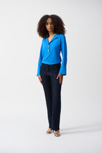 Load image into Gallery viewer, Indulge in the casual elegance of this lovely gauze top. The piece is tailored in a polished straight silhouette with a sleek shirt collar and front buttons, a classic, yet versatile look that can effortlessly transition from morning meetings to evening cocktails. The three-quarter sleeves with folded cuffs add character to this modern-style staple.
