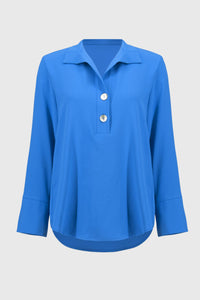 Indulge in the casual elegance of this lovely gauze top. The piece is tailored in a polished straight silhouette with a sleek shirt collar and front buttons, a classic, yet versatile look that can effortlessly transition from morning meetings to evening cocktails. The three-quarter sleeves with folded cuffs add character to this modern-style staple.