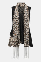 Load image into Gallery viewer, This chiffon tunic boasts a captivating animal print that exudes undeniable glamour. The piece features a sleeveless A-line silhouette and a chic scoop neckline, lending a sophisticated feel with timeless appeal. The garment’s reversible design and detachable scarf with fringe at the hem allow you to transform your look to suit any occasion. 

