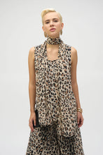 Load image into Gallery viewer, This chiffon tunic boasts a captivating animal print that exudes undeniable glamour. The piece features a sleeveless A-line silhouette and a chic scoop neckline, lending a sophisticated feel with timeless appeal. The garment’s reversible design and detachable scarf with fringe at the hem allow you to transform your look to suit any occasion. 
