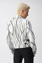 Load image into Gallery viewer, Elevated by a stunning floral print, this Joseph Ribkoff fitted faux-suede jacket is destined to be the focal point of any outfit. With a sophisticated notched collar and a single hook &amp; eye closure, this signature layering piece will breathe life into your wardrobe.
