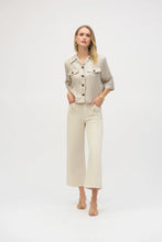 Load image into Gallery viewer, Refresh your casual wardrobe with this fabulously versatile Joseph Ribkoff short-sleeved jacket, crafted from a foiled linen blend fabric. Featuring a shirt collar, flap chest pockets, and contrast buttons, this piece can be layered over a simple tee or dress for an effortlessly stylish look.
