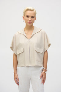The definition of sporty chic, this Joseph Ribkoff hooded nylon jacket adds a trendy edge to your look. Featuring unexpected short dolman sleeves, front flap pockets, and a front zipper closure, it’s designed with a pleated back hem for added flair. An adjustable bungee cord lets you customize the relaxed fit to your liking.